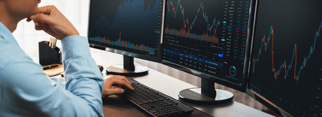 Poster - Stock trading investor monitoring dynamic financial data graph for profitable trade. Businessman or broker with analytic thinking analyzing data for stock market exchange trading company. Trailblazing