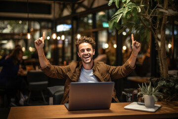 Wall Mural - Laughing Mel freelancer, online blogger working on laptop computer in coffee shop.