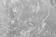 White Plastic Or Polyethylene Bag Texture, Transparant Wrinkled Plastic, Macro, White Background
