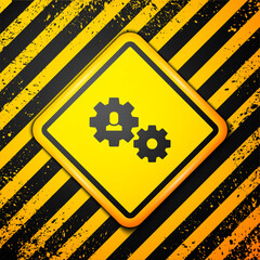 Sticker - Black Human with gear icon isolated on yellow background. Artificial intelligence. Thinking brain sign. Symbol work of brain. Warning sign. Vector