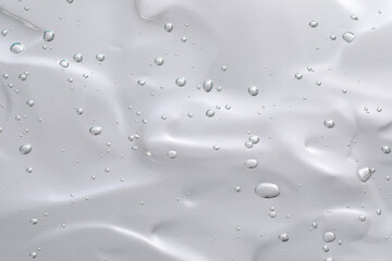 Canvas Print - Transparent cleansing gel on light grey background, top view. Cosmetic product