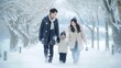 © Shabnam - Lovely asian family strolling together in scene cover with brilliant snow