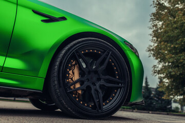 Canvas Print - The air intake of a sports car on the fender	