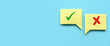 © MohamadFaizal - Concept of evaluation. True or false symbol. Accepted or rejected. Yes or no icon over a yellow bubble chat on blue background with copy space.