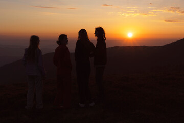 Wall Mural - girls tourists in the mountains