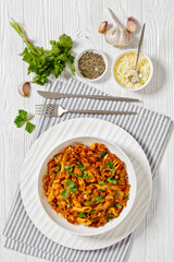 Wall Mural - Ground Chicken Pasta Bake in white bowl, top view