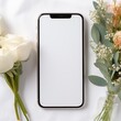 wedding table with smartphone and flowers, phone mockup