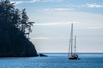 Wall Mural - Sail boat anchoring at Deception Pass in Washington