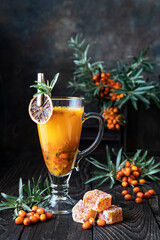 Sea buckthorn hot tea, autumn drinks concept