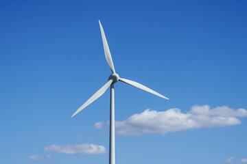 Wall Mural - Wind turbine blades on blue sky background