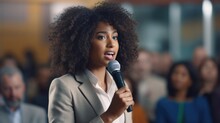 A Black Woman Entrepreneur Addresses A Powerful Speech At A Public Forum, Calling Out The Racial Biases And Lack Of Opportunities For Minorities In The Corporate Sector. Her Expressive Eyes