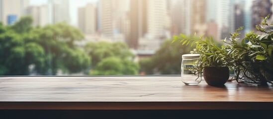 Wall Mural - Blurred window background with a wooden desk and open space