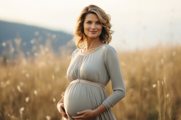 Pregnant woman. Tender portrait with selective focus