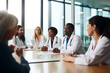 © AspctStyle - Diverse group of doctor having a meeting in conference room. Teamwork, innovation and doctors collaboration in meeting in conference room