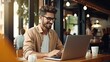 © somchai20162516 - Freelance handsome man working with laptop in coffee shop