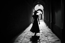 Silhouette Of A Woman On A Street