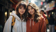 © JKLoma - two japanese girls walking in shopping streets of tokyo enjoying the city.
