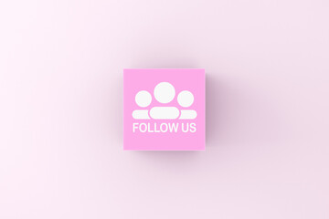 Wall Mural - Follow us message on a pink cube block. Social Media Networking Internet Online Concept.