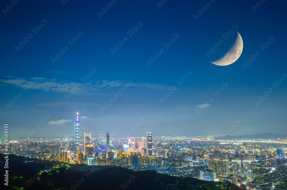 Urban splendor at night: Watch the dynamic clouds and moon above the ...