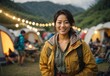Bussines asian women camping smiling wearing camping outfit with camping place in the Background, crossed hand confident