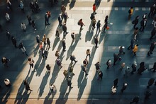 Aerial View Of A Crowd Crossing The Street In Sun Light