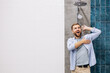 © Petro - Man at the building market choosing shower for his bathroom