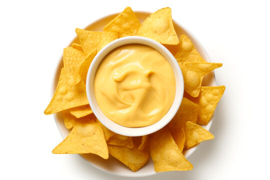 nachos chips on a plate with cheese sauce in the middle isolated on white background, top view .gene