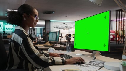 Poster - Creative Black Woman Using Desktop Computer with Mock-up Green Screen Chromakey. Female Concept Artist Working in Game Design Startup, Creating Immersive Gameplay For New Survival Video Game.