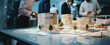 business complex scale model on the table. real estate developers, architects and businessmen team working on new project in office. banner with copy space