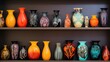 A collection of colorful vases on a shelf