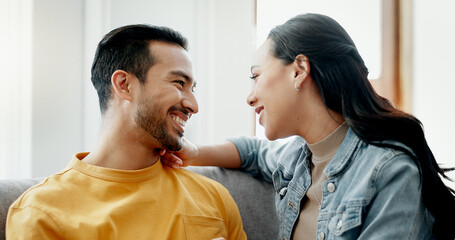 Poster - Conversation, funny and couple on sofa in home living room, bonding and having fun. Smile, communication of man and woman in lounge for healthy connection of love, happy or laughing together in house