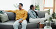 © Clement Coetzee/peopleimages.com - Unhappy, fight and couple angry on a couch together duo to infertility, argument and toxic relationship in a home. Conflict, divorce and man has problem with woman in a living room sofa for cheating