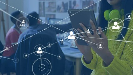Poster - Animation of network of profile icons against mid section of a woman using digital tablet at office