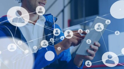 Poster - Animation of network of profile icons against happy caucasian man using digital tablet at office