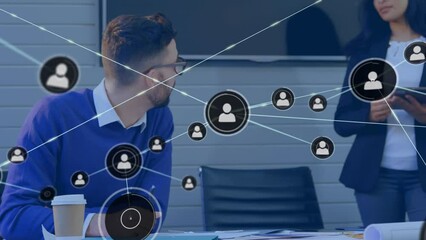 Poster - Animation of network of profile icons against diverse man and woman discussing at office