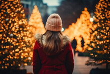 Winter Wonder: Back View Of Woman By Christmas Tree