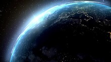 Repeated Rotation Of Planet Earth With Glowing Cities, View From Space On The Background Of Stars. Beautiful Sunset, Setting Sun Over The Spinning Globe. Seamless Loop Animation. 4k Footage