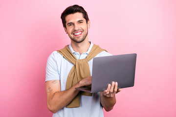 Aufkleber - Photo of young man handsome expert technical support specialist hold netbook answer his clients chat isolated on pink color background