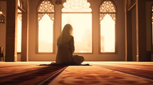 A Religious Muslim Woman Praying Inside The Mosque. Muslim.