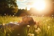 © VERTEX SPACE - Cheerful young woman smiling and enjoying in the sunset. Woman lying on the grass young woman laying in a field of bluebonnet wildflowers