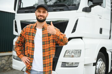 Portrait of confident truck driver on parking lot. Copy space