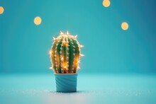 Lone Cactus Decorated With Christmas Light Garland On Blue Background.