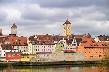 Wall Mural - Clock tower and colorful old buildings in Regensburg Germany