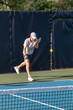 © pics721 - Male Pickleball Player Serving
