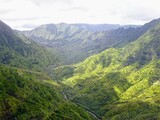 Fototapeta Do pokoju - Sky view of the mountains and valleys of Kauai 