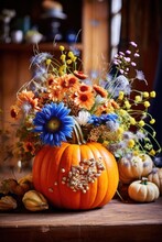 Handmade Decoration For Autumn Holidays, Thanksgiving, Halloween With Pumpkins And Fall Flowers In Bright Blue And Orange Colors
