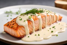 A Piece Of Cooked Salmon Fish Filet Steak With Sour Cream Bechamel Sauce And Fresh Green Dill, Close-up.