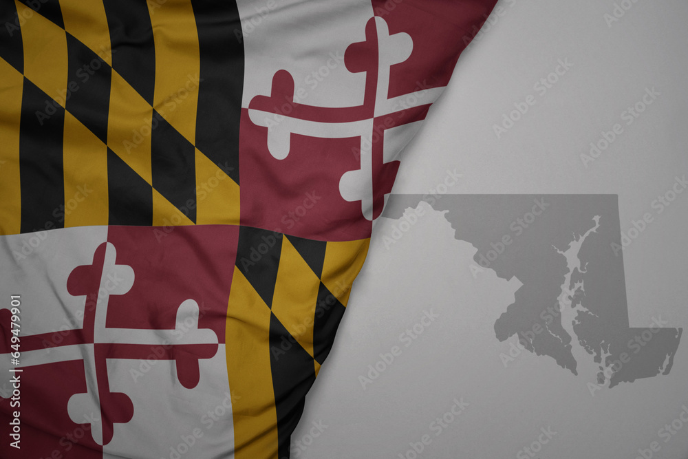 big waving national colorful flag and map of maryland state on the gray ...