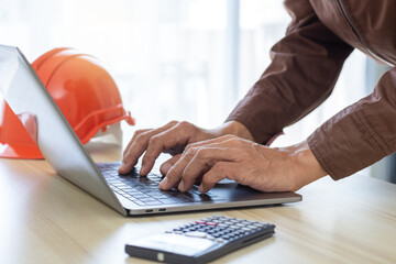 Wall Mural - Male engineer using computer