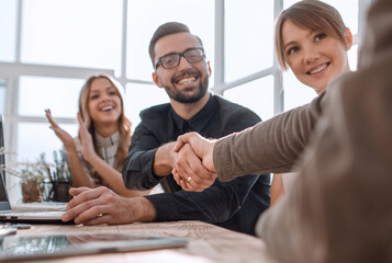 Poster - handshake business people at a meeting in the office